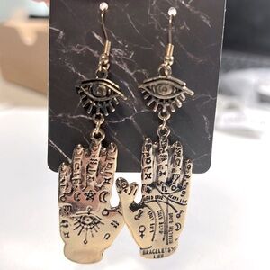 Gold dangling Hand Eye Earrings